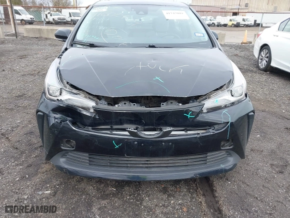 2022 Toyota Prius L Eco with VIN JTDKAMFUXN3174204, listed as a IAAI auction lot 41747089 with 79,531 mi miles. Bid and sale history available at carsss.com. Image 6.