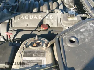 2001 Jaguar XK с VIN SAJDA42C81NA14881, выставлен на аукционе IAAI как лот 41317312 с пробегом 141 755 миль миль и . История ставок и продаж доступна на DreamBid. Изображение 12.
