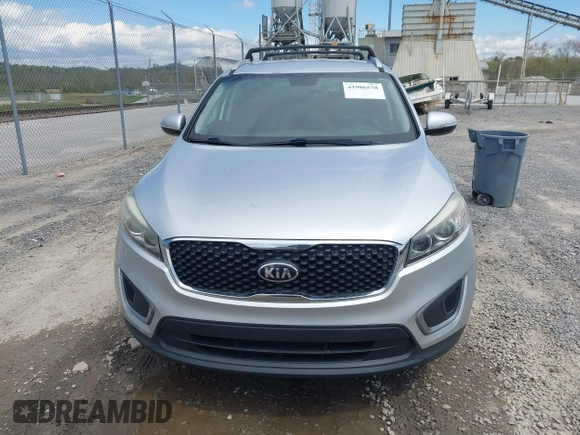 2016 Kia Sorento LX with VIN 5XYPG4A35GG048897, listed as a IAAI auction lot 41986578 with 161,157 mi miles. Bid and sale history available at carsss.com. Image 12.