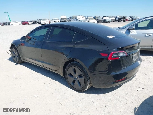 2022 Tesla Model 3 Long Range with VIN 5YJ3E1EB2NF174028, listed as a IAAI auction lot 41697310 with NaN miles. Bid and sale history available at carsss.com. Image 3.