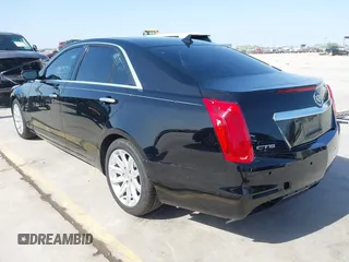 2014 Cadillac CTS Luxury RWD with VIN 1G6AR5SX5E0196321, listed as a IAAI auction lot 41811575 with 139,115 mi miles. Bid and sale history available at carsss.com. Image 3.