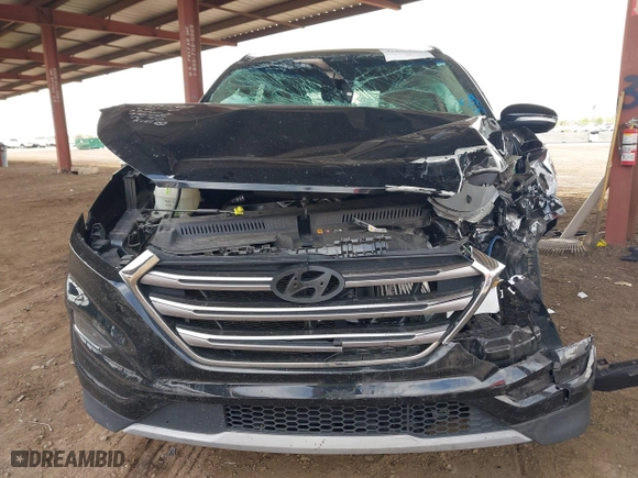 2017 Hyundai Tucson Value with VIN KM8J33A22HU316495, listed as a IAAI auction lot 41896507 with 82,517 mi miles. Bid and sale history available at carsss.com. Image 12.