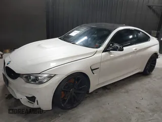 2017 BMW M4 with VIN WBS3R9C5XHK709445, listed as a IAAI auction lot 39303430 with 59,095 mi miles. Bid and sale history available at carsss.com. Image 2.