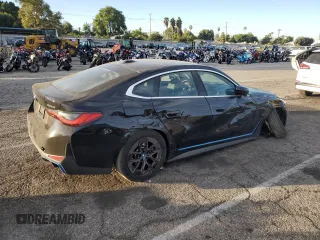 2023 BMW i4 eDrive40 z VIN WBY73AW06PFR11815, wystawiony jako Copart lot #73943643 z przebiegiem 5 262 mil mil oraz . Historia ofert i sprzedaży dostępna na DreamBid. Obrazek 3.