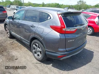2018 Honda CR-V EX with VIN 2HKRW2H58JH613523, listed as a IAAI auction lot 42104837 with 122,981 mi miles and . Bid and sale history available at DreamBid. Image 3.