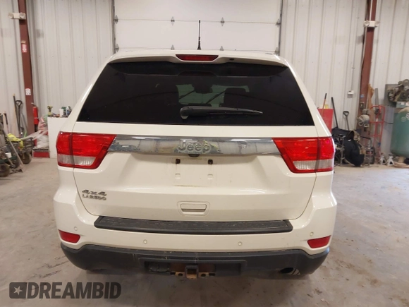 2011 Jeep Grand Cherokee 70th Anniversary with VIN 1J4RR4GG4BC702759, listed as a IAAI auction lot 41871604 with 143,583 mi miles. Bid and sale history available at carsss.com. Image 16.