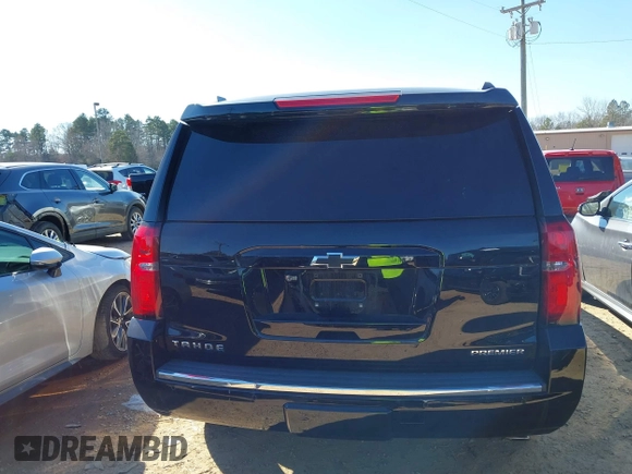 2020 Chevrolet Tahoe LTZ with VIN 1GNSCCKCXLR106732, listed as a IAAI auction lot 41486660 with Not provided miles and . Bid and sale history available at DreamBid. Image 17.