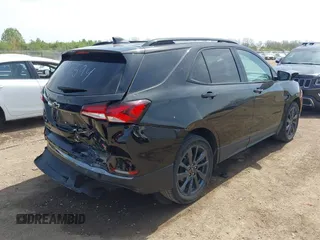 2023 Chevrolet Equinox RS z VIN 3GNAXMEG5PL107594, wystawiony jako IAAI lot #42093279 z przebiegiem 59 663 mil mil oraz . Historia ofert i sprzedaży dostępna na DreamBid. Obrazek 4.