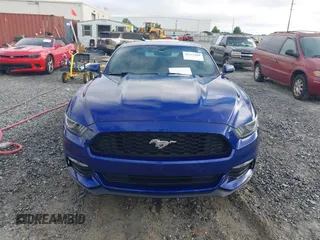2015 Ford Mustang V6 z VIN 1FA6P8AM6F5411572, wystawiony jako IAAI lot #42377268 z przebiegiem 56 049 mil mil oraz . Historia ofert i sprzedaży dostępna na DreamBid. Obrazek 6.