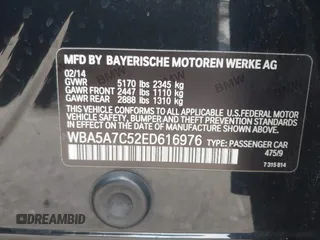 2014 BMW 5 Series 528i xDrive with VIN WBA5A7C52ED616976, listed as a IAAI auction lot 42067334 with 98,286 mi miles and . Bid and sale history available at DreamBid. Image 9.