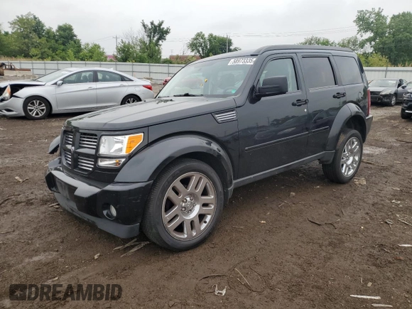 2011 Dodge Nitro Heat with VIN 1D4PT4GK7BW597557, listed as a Copart auction lot 58973335 with 180,958 mi miles and Salvage title. Bid and sale history available at DreamBid. Image 1.