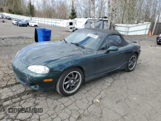 2002 Mazda MX-5 Miata Cloth z VIN JM1NB353720229783, wystawiony jako Copart lot #48253935 z przebiegiem 229 018 mil mil oraz Szkoda całkowita • Salvage title. Historia ofert i sprzedaży dostępna na DreamBid. Obrazek 1.