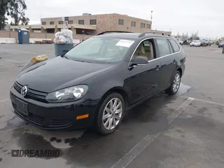2012 Volkswagen Jetta SportWagen TDI with VIN 3VWPL7AJ3CM657816, listed as a IAAI auction lot 41473792 with 82,447 mi miles. Bid and sale history available at carsss.com. Image 6.