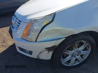 2015 Cadillac SRX Performance Collection with VIN 3GYFNFE35FS573814, listed as a IAAI auction lot 41770696 with 119,205 mi miles and . Bid and sale history available at DreamBid. Image 6.