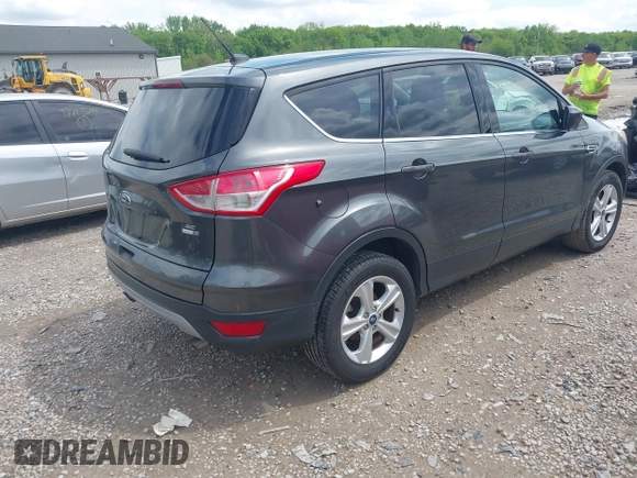 2016 Ford Escape SE with VIN 1FMCU9GXXGUC81604, listed as a IAAI auction lot 42222349 with 106,188 mi miles and . Bid and sale history available at DreamBid. Image 4.