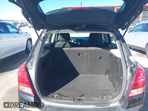 2015 Chevrolet Trax LS with VIN KL7CJKSBXFB068806, listed as a IAAI auction lot 41680339 with 129,882 mi miles. Bid and sale history available at carsss.com. Image 18.