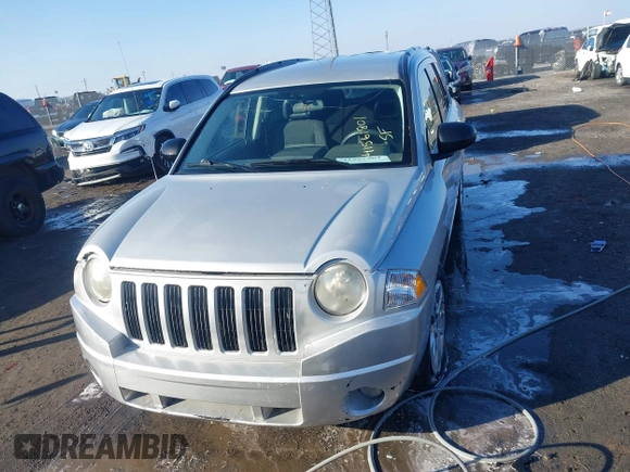 2008 Jeep Compass Sport with VIN 1J8FT47098D665734, listed as a IAAI auction lot 41561801 with 169,446 mi miles. Bid and sale history available at carsss.com. Image 12.