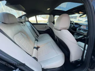 2021 BMW 3 Series 330i with VIN 3MW5R1J04MBB48483, listed as a Copart auction lot 50515195 with 128,555 mi miles and Clean Title. Bid and sale history available at carsss.com. Image 6.