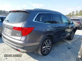 2016 Honda Pilot Elite with VIN 5FNYF6H01GB050555, listed as a IAAI auction lot 41670197 with 140,000 mi miles. Bid and sale history available at carsss.com. Image 4.