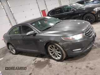 2015 Ford Taurus Limited with VIN 1FAHP2J86FG106828, listed as a IAAI auction lot 41748997 with 221,216 mi miles. Bid and sale history available at carsss.com. Image 13.