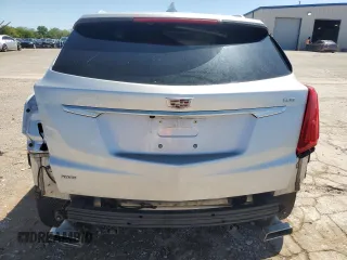 2019 Cadillac XT5 Premium Luxury AWD with VIN 1GYKNFRS6KZ233259, listed as a Copart auction lot 53647695 with 128,534 mi miles and Salvage title. Bid and sale history available at DreamBid. Image 6.