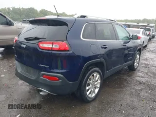 2014 Jeep Cherokee Limited with VIN 1C4PJMDS0EW277301, listed as a IAAI auction lot 42357034 with 61,825 mi miles and . Bid and sale history available at DreamBid. Image 4.