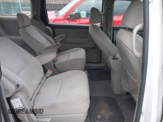 2015 Kia Sedona L with VIN KNDMA5C12F6031286, listed as a IAAI auction lot 42002214 with 185,814 mi miles. Bid and sale history available at carsss.com. Image 8.