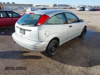 2007 Ford Focus S with VIN 1FAFP31N97W218727, listed as a IAAI auction lot 41001411 with 135,456 mi miles and . Bid and sale history available at carsss.com. Image 4.