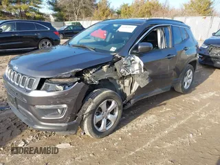 2018 Jeep Compass Latitude with VIN 3C4NJDBB0JT316396, listed as a IAAI auction lot 41482668 with 65,340 mi miles and . Bid and sale history available at DreamBid. Image 2.