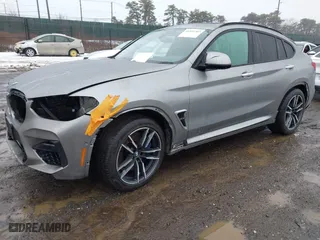 2021 BMW X4 M with VIN 5YMUJ0C01M9F26207, listed as a IAAI auction lot 41502307 with NaN miles. Bid and sale history available at carsss.com. Image 18.