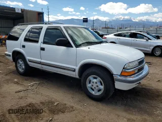 1999 Chevrolet Blazer Trailblazer z VIN 1GNDT13W0X2169505, wystawiony jako Copart lot #54000505 z przebiegiem 181 903 mil mil oraz Szkoda całkowita • Salvage title. Historia ofert i sprzedaży dostępna na DreamBid. Obrazek 4.