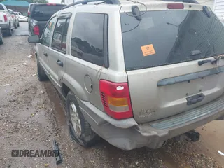 2003 Jeep Grand Cherokee Laredo z VIN 1J4GW48S33C599693, wystawiony jako IAAI lot #42228885 z przebiegiem 257 551 mil mil oraz . Historia ofert i sprzedaży dostępna na DreamBid. Obrazek 3.