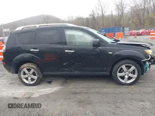 2007 Mitsubishi Outlander XLS z VIN JA4MT41X97Z018573, wystawiony jako IAAI lot #41937728 z przebiegiem 151 346 mil mil oraz . Historia ofert i sprzedaży dostępna na DreamBid. Obrazek 14.