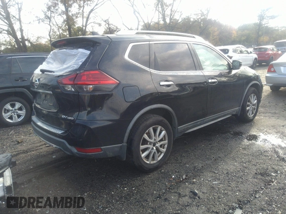 2017 Nissan Rogue SV with VIN KNMAT2MV7HP606962, listed as a IAAI auction lot 40924941 with 129,183 mi miles. Bid and sale history available at carsss.com. Image 4.