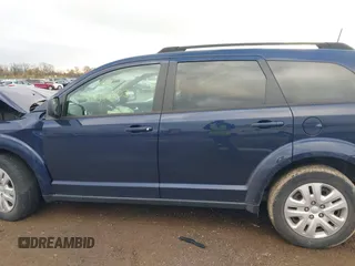 2019 Dodge Journey SE with VIN 3C4PDCBB5KT821412, listed as a IAAI auction lot 40901003 with 27,099 mi miles and . Bid and sale history available at DreamBid. Image 14.