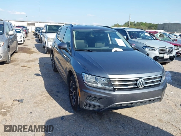 2020 Volkswagen Tiguan SE with VIN 3VV3B7AXXLM137641, listed as a IAAI auction lot 41830400 with 68,067 mi miles and . Bid and sale history available at DreamBid. Image 1.