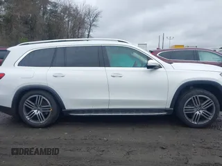 2021 Mercedes-Benz GLS 450 z VIN 4JGFF5KEXMA386713, wystawiony jako IAAI lot #41966263 z przebiegiem 63 039 mil mil oraz . Historia ofert i sprzedaży dostępna na DreamBid. Obrazek 13.