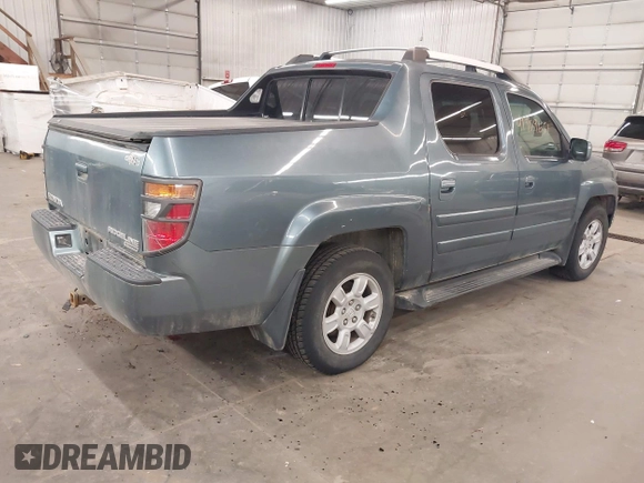 2006 Honda Ridgeline RTL with VIN 2HJYK16556H508101, listed as a IAAI auction lot 41909651 with 301,945 mi miles. Bid and sale history available at carsss.com. Image 4.