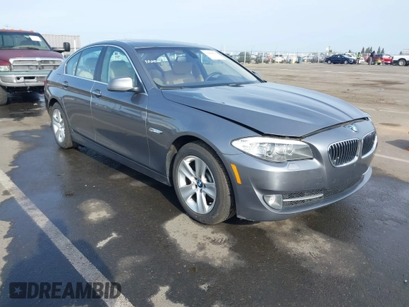 2012 BMW 5 Series 528i with VIN WBAXG5C53CDX04248, listed as a IAAI auction lot 42004099 with 197,776 mi miles. Bid and sale history available at carsss.com. Image 1.