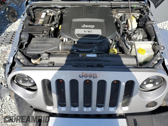 2015 Jeep Wrangler Sahara z VIN 1C4AJWBG8FL513650, wystawiony jako Copart lot #54578075 z przebiegiem 38 043 mil mil oraz Nie do naprawy • Non repairable. Historia ofert i sprzedaży dostępna na DreamBid. Obrazek 11.