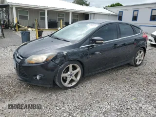 2014 Ford Focus Titanium with VIN 1FADP3N22EL451757, listed as a Copart auction lot 55260395 with 78,924 mi miles and Salvage title. Bid and sale history available at DreamBid. Image 1.