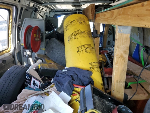 2005 Chevrolet Express Cargo z VIN 1GCFG15X751112877, wystawiony jako Copart lot #77494014 z przebiegiem 349 555 mil mil oraz Czysty tytuł • Clean title. Historia ofert i sprzedaży dostępna na DreamBid. Obrazek 10.