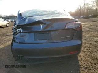 2023 Tesla Model 3 Long Range with VIN 5YJ3E1EBXPF660900, listed as a Copart auction lot 48923265 with 9,954 mi miles and Salvage Title. Bid and sale history available at DreamBid. Image 6.