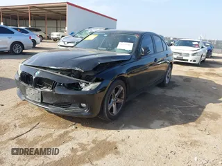 2013 BMW 3 Series 328i with VIN WBA3C1C51DF440679, listed as a IAAI auction lot 41533587 with 184,812 mi miles. Bid and sale history available at carsss.com. Image 17.