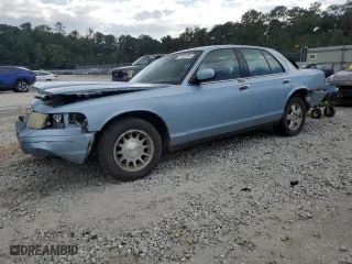 1999 Ford Crown Victoria LX with VIN 2FAFP74WXXX137154, listed as a Copart auction lot 71418784 with 97,589 mi miles and Salvage Title. Bid and sale history available at carsss.com. Image 1.