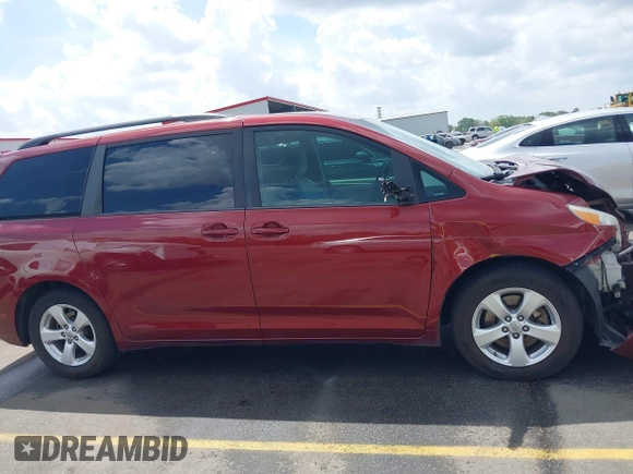 2015 Toyota Sienna LE AAS with VIN 5TDKK3DC7FS685452, listed as a IAAI auction lot 41942789 with 194,163 mi miles. Bid and sale history available at carsss.com. Image 13.