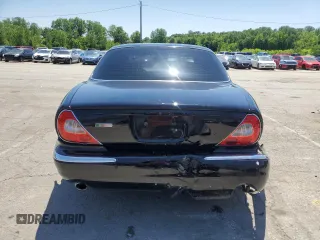 2004 Jaguar XJ с VIN SAJEA73B34TG10749, выставлен на аукционе Copart как лот 56574025 с пробегом 72 240 миль миль и Списание • Salvage title. История ставок и продаж доступна на DreamBid. Изображение 6.