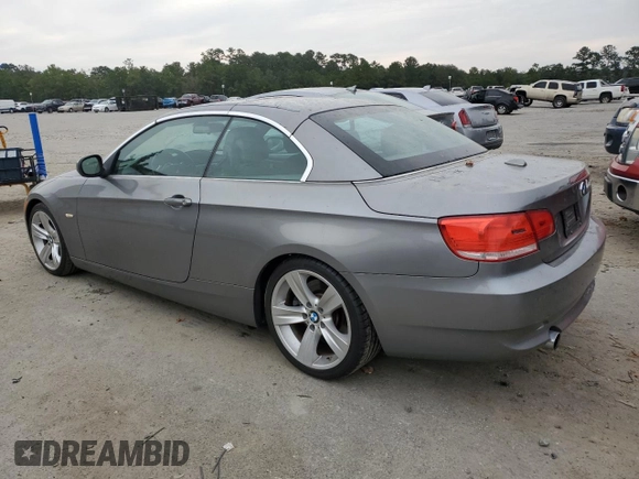 2010 BMW 3 Series 335i with VIN WBAWL7C50AP476272, listed as a Copart auction lot 74719554 with 77,117 mi miles and Salvage Title. Bid and sale history available at carsss.com. Image 2.
