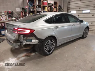 2018 Ford Fusion Titanium with VIN 3FA6P0D91JR138698, listed as a IAAI auction lot 41992522 with 95,017 mi miles and . Bid and sale history available at DreamBid. Image 4.