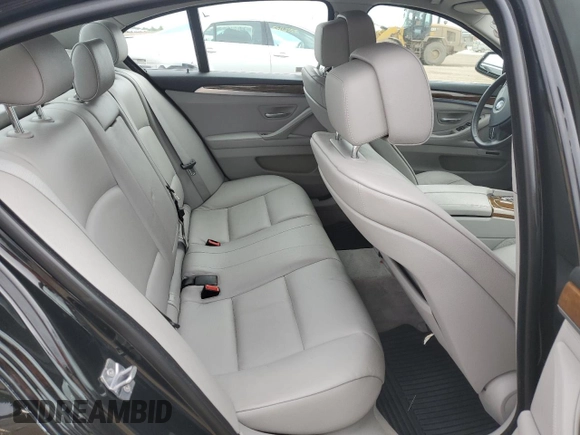 2013 BMW 5 Series 528i xDrive z VIN WBAXH5C58DD108132, wystawiony jako Copart lot #57969865 z przebiegiem 68 308 mil mil oraz Szkoda całkowita • Salvage title. Historia ofert i sprzedaży dostępna na DreamBid. Obrazek 10.